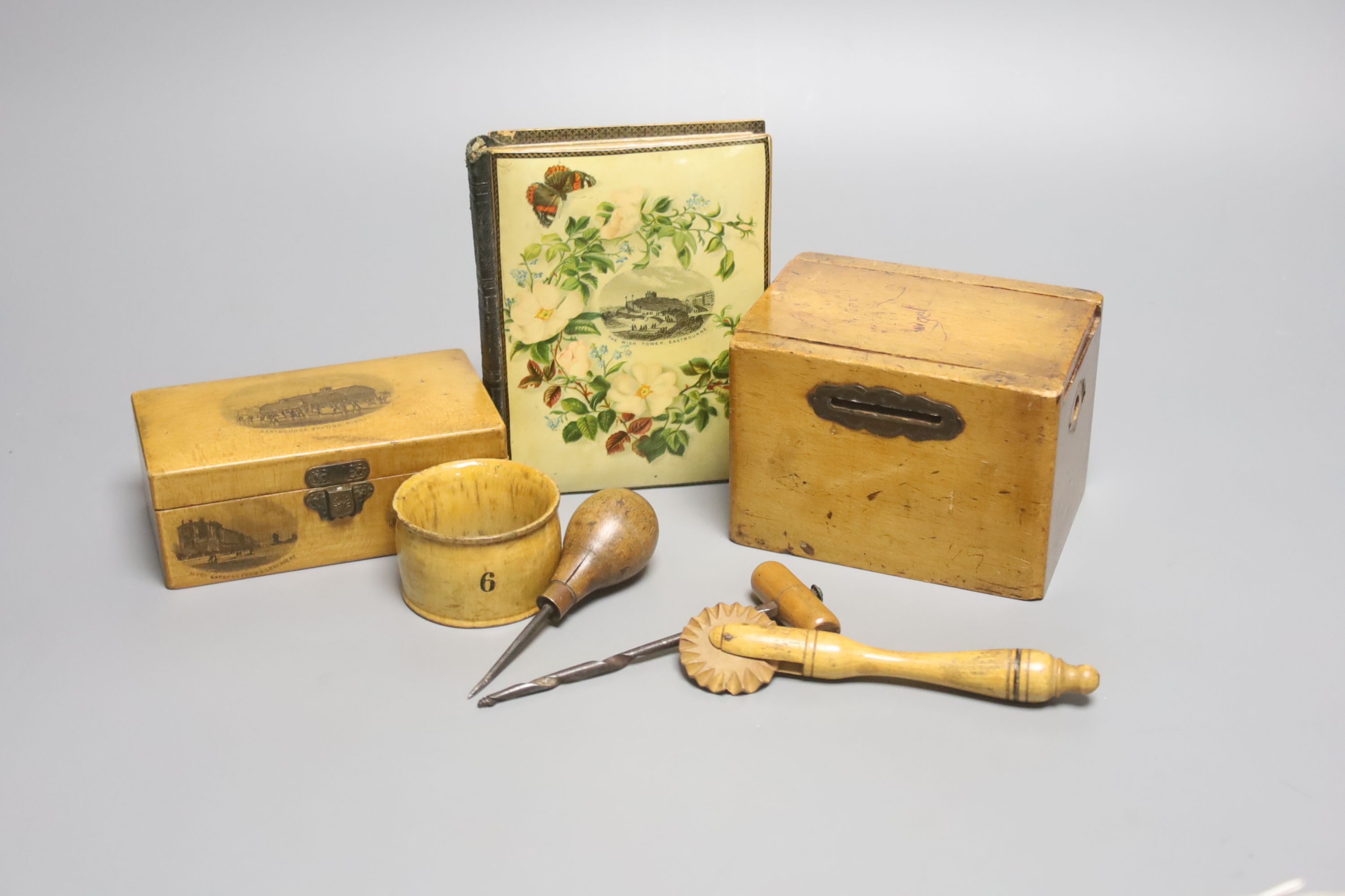 A Victorian Mauchline ware album and box, Eastbourne Wish Tower and skating rink, and 4 other items